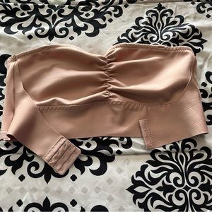 Strapless bandeau bra in size 2XL. Comes with clear straps as well.